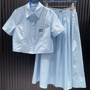 MIU MIU blue suit with short-sleeved top and skirt